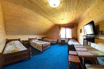 Фото номера Четырехместный номер Курортные отели Hotel Podgorie Spa г. Буковель 3