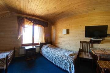 Фото номера Четырехместный номер Курортные отели Hotel Podgorie Spa г. Буковель 5