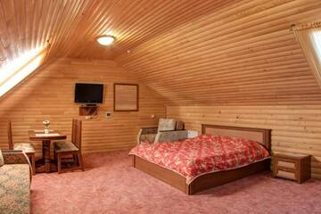 Фото номера Четырехместный номер &quot;Комфорт&quot; Курортные отели Hotel Podgorie Spa г. Буковель 17