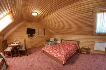 Фото номера Четырехместный номер &quot;Комфорт&quot; Курортные отели Hotel Podgorie Spa г. Буковель 19