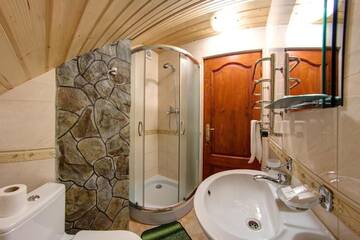 Фото номера Улучшенный люкс с 2 спальнями Курортные отели Hotel Podgorie Spa г. Буковель 10