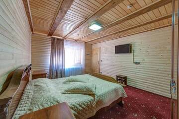 Фото номера Коттедж (для 8 взрослых) Курортные отели Hotel Podgorie Spa г. Буковель 7