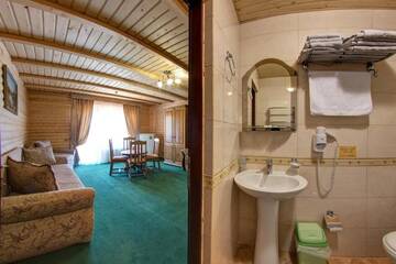 Фото номера Люкс с кухней Курортные отели Hotel Podgorie Spa г. Буковель 8