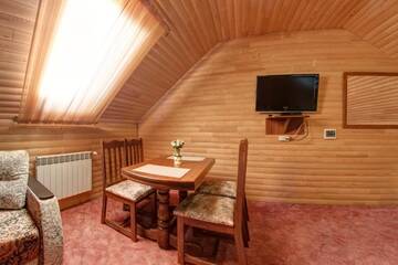 Фото номера Четырехместный номер &quot;Комфорт&quot; Курортные отели Hotel Podgorie Spa г. Буковель 3