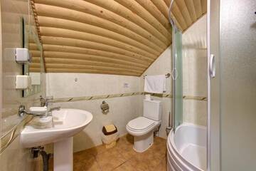 Фото номера Четырехместный номер &quot;Комфорт&quot; Курортные отели Hotel Podgorie Spa г. Буковель 10