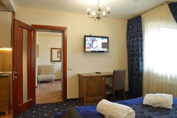 Фото номера Семейный номер в мансарде, право посещения спа-центра Отель Tavel Hotel &amp; SPA г. Буковель 3