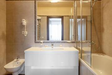 Фото номера Апартаменты с возможностью посещения спа-салона. Отель Tavel Hotel &amp; SPA г. Буковель 3