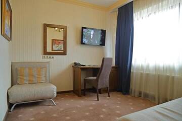 Фото номера Семейный номер в мансарде, право посещения спа-центра Отель Tavel Hotel &amp; SPA г. Буковель 8