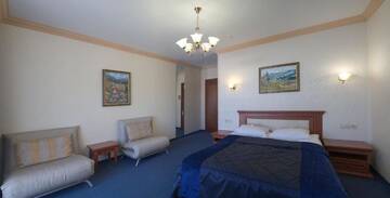 Фото номера Полулюкс с доступом в спа-центр Отель Tavel Hotel &amp; SPA г. Буковель 3
