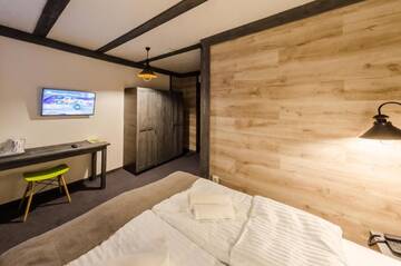 Фото номера Двухместный номер с 1 кроватью Отель Chalet CrepDeChine Hotel г. Буковель 5