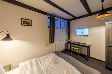 Фото номера Двухместный номер с 1 кроватью Отель Chalet CrepDeChine Hotel г. Буковель 6
