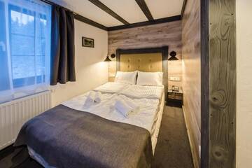 Фото номера Стандартный двухместный номер с 1 кроватью и видом на горы Отель Chalet CrepDeChine Hotel г. Буковель 17