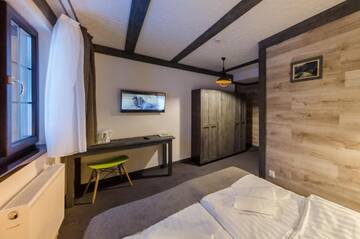 Фото номера Стандартный двухместный номер с 1 кроватью и видом на горы Отель Chalet CrepDeChine Hotel г. Буковель 13