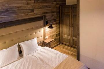 Фото номера Стандартный двухместный номер с 1 кроватью и видом на горы Отель Chalet CrepDeChine Hotel г. Буковель 24