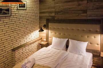 Фото номера Стандартный двухместный номер с 1 кроватью и видом на горы Отель Chalet CrepDeChine Hotel г. Буковель 28
