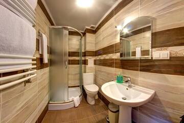 Фото номера Стандартный двухместный номер с 1 кроватью Отель Hotel Gutsulia г. Буковель 7