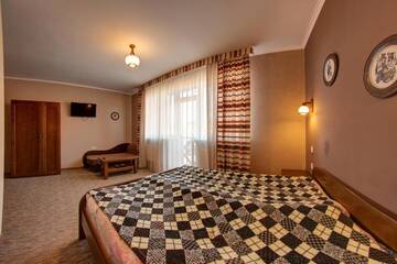 Фото номера Стандартный двухместный номер с 1 кроватью Отель Hotel Gutsulia г. Буковель 8