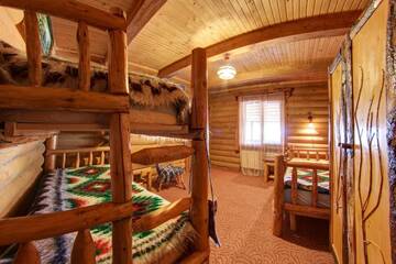 Фото номера Коттедж с 5 спальнями Отель Hotel Gutsulia г. Буковель 6