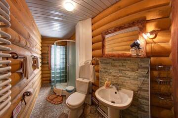 Фото номера Коттедж с 5 спальнями Отель Hotel Gutsulia г. Буковель 18