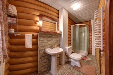 Фото номера Коттедж с 5 спальнями Отель Hotel Gutsulia г. Буковель 12