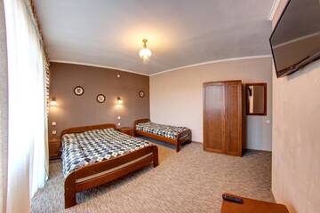 Фото номера Стандартный трехместный номер Отель Hotel Gutsulia г. Буковель 4