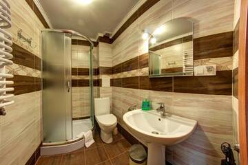 Фото номера Четырехместный номер Отель Hotel Gutsulia г. Буковель 4