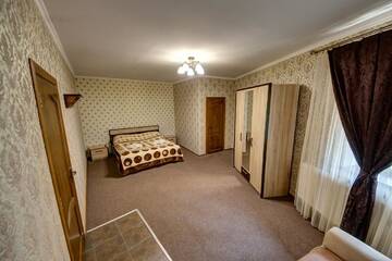 Фото номера Трехместный номер Отель Villa Vlad г. Буковель 4