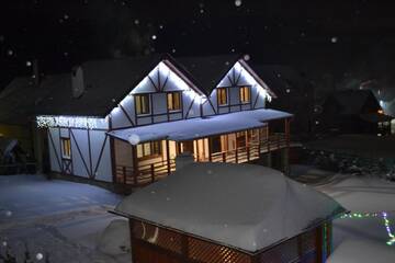 Фото номера Апартаменты с 2 спальнями Гостевой дом Aura Karpat г. Буковель 4