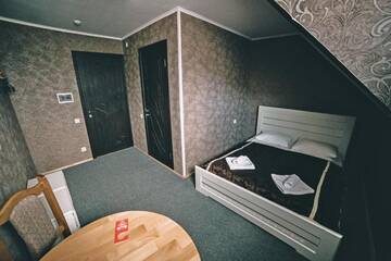 Фото номера Двухместный номер эконом-класса на мансардном этаже Отель Alpin Hotel г. Буковель 3