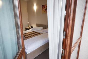 Фото номера Семейный номер с видом на горы Отель Graal resort г. Буковель 2