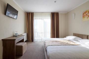 Фото номера Стандартный двухместный номер с 1 кроватью Отель Graal resort г. Буковель 9