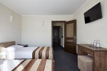 Фото номера Стандартный двухместный номер с 1 кроватью Отель Graal resort г. Буковель 10