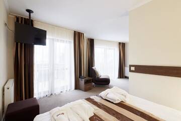 Фото номера Люкс с видом на горы Отель Graal resort г. Буковель 2