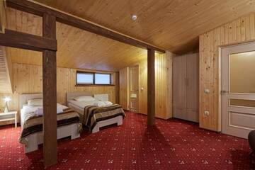 Фото номера Двухместный номер эконом-класса с 2 отдельными кроватями Отель Graal resort г. Буковель 3