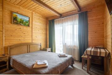 Фото номера Стандартный двухместный номер с 1 кроватью и балконом Отель Arnika Hotel г. Буковель 6