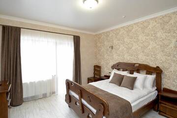 Фото номера Стандартный двухместный номер с 1 кроватью и балконом Отель Carparosa Hotel г. Буковель 2