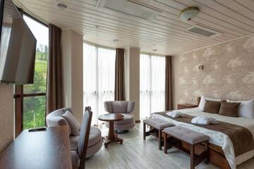 Фото номера Апартаменты - Двухуровневые Отель Carparosa Hotel г. Буковель 5