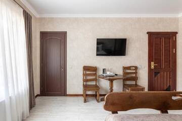 Фото номера Улучшенный двухместный номер с 1 кроватью и балконом Отель Carparosa Hotel г. Буковель 5
