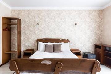 Фото номера Улучшенный двухместный номер с 1 кроватью и балконом Отель Carparosa Hotel г. Буковель 6
