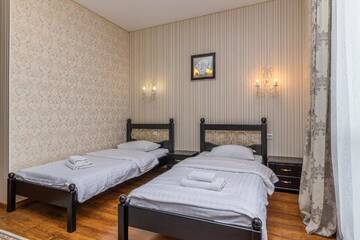 Фото номера Стандартный двухместный номер с 2 отдельными кроватями Отель Hotel Pid Strihoju г. Буковель 5