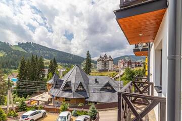 Фото номера Двухместный номер с 1 кроватью и балконом Отель Hotel Pid Strihoju г. Буковель 4