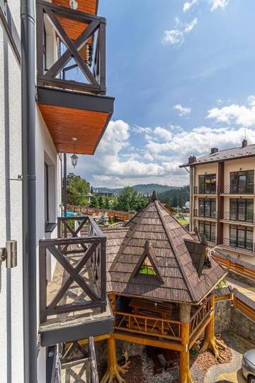 Фото номера Двухместный номер с 1 кроватью и балконом Отель Hotel Pid Strihoju г. Буковель 5