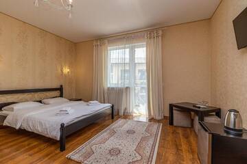 Фото номера Двухместный номер с 1 кроватью и балконом Отель Hotel Pid Strihoju г. Буковель 7