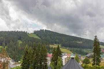 Фото номера Двухместный номер Делюкс с 1 кроватью и балконом Отель Hotel Pid Strihoju г. Буковель 6
