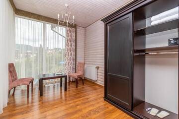 Фото номера Двухместный номер Делюкс с 1 кроватью и балконом Отель Hotel Pid Strihoju г. Буковель 7
