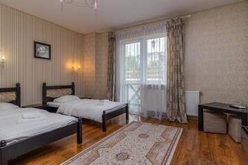 Фото номера Стандартный двухместный номер с 2 отдельными кроватями Отель Hotel Pid Strihoju г. Буковель 2