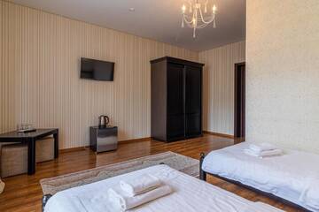 Фото номера Стандартный двухместный номер с 2 отдельными кроватями Отель Hotel Pid Strihoju г. Буковель 3
