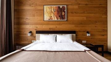 Фото номера Двухместный номер с 1 кроватью и балконом Отель Chalet du Mont г. Буковель 6