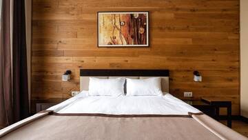 Фото номера Двухместный номер с 1 кроватью и балконом Отель Chalet du Mont г. Буковель 3