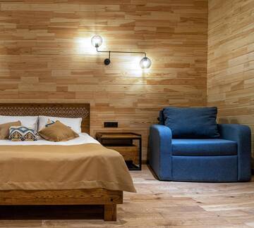 Фото номера Двухместный номер Делюкс с 1 кроватью Отель Chalet du Mont г. Буковель 2
